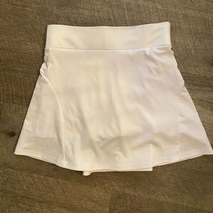 White athletic tennis skort for tennis, pickleball or golf
